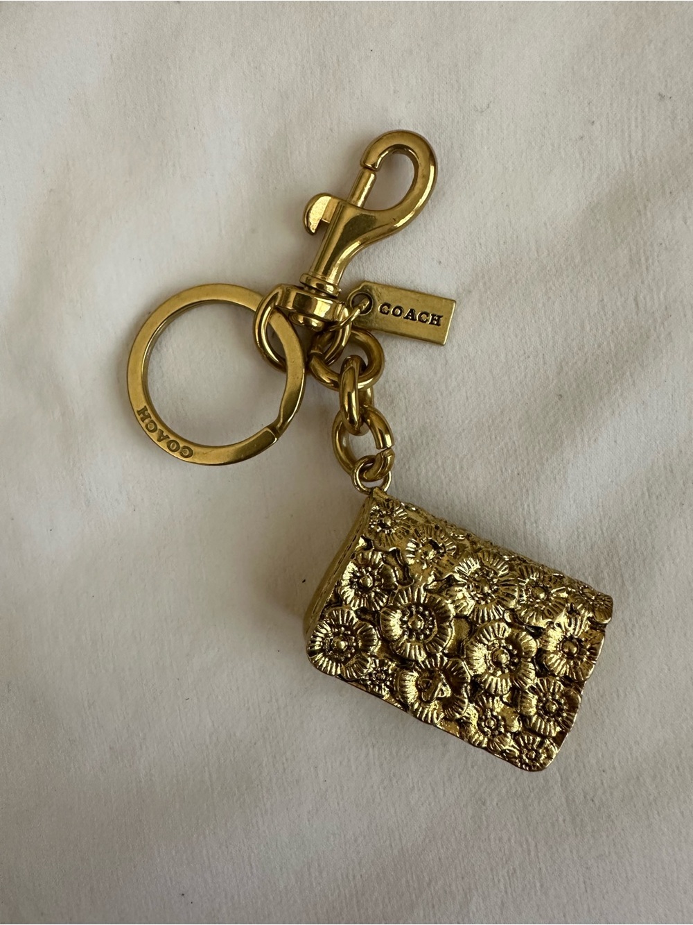 COACH Gold Floral Embossed Bag Charm Key Holder
